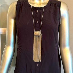 Gold necklace with long cream stone and chain pendant